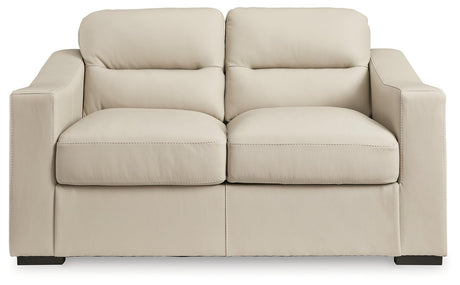 Treasure Trove Almond Loveseat by Ashley at Eve Furniture