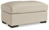 Treasure Trove Almond Ottoman by Ashley at Eve Furniture