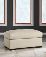 Treasure Trove Almond Ottoman by Ashley at Eve Furniture