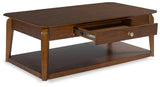 Trenmour Medium Brown Coffee Table by Ashley at Eve Furniture