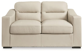 Treasure Trove Almond Loveseat by Ashley at Eve Furniture