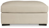 Tresure Trove Almond Ottoman by Ashley at Eve Furniture