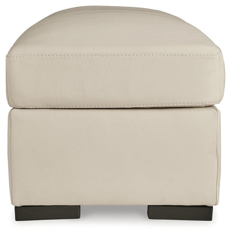 Tresure Trove Almond Ottoman by Ashley at Eve Furniture
