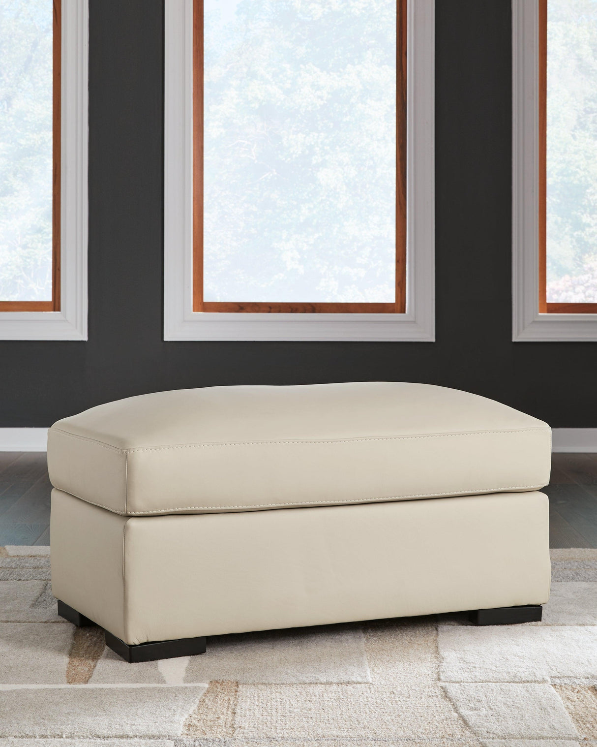 Tresure Trove Almond Ottoman by Ashley at Eve Furniture