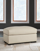 Tresure Trove Almond Ottoman by Ashley at Eve Furniture