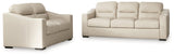 Tresure Trove Almond Sofa and Loveseat by Ashley at Eve Furniture