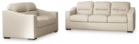 Tresure Trove Almond Sofa and Loveseat by Ashley at Eve Furniture