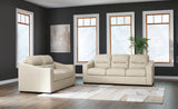 Tresure Trove Almond Sofa and Loveseat by Ashley at Eve Furniture