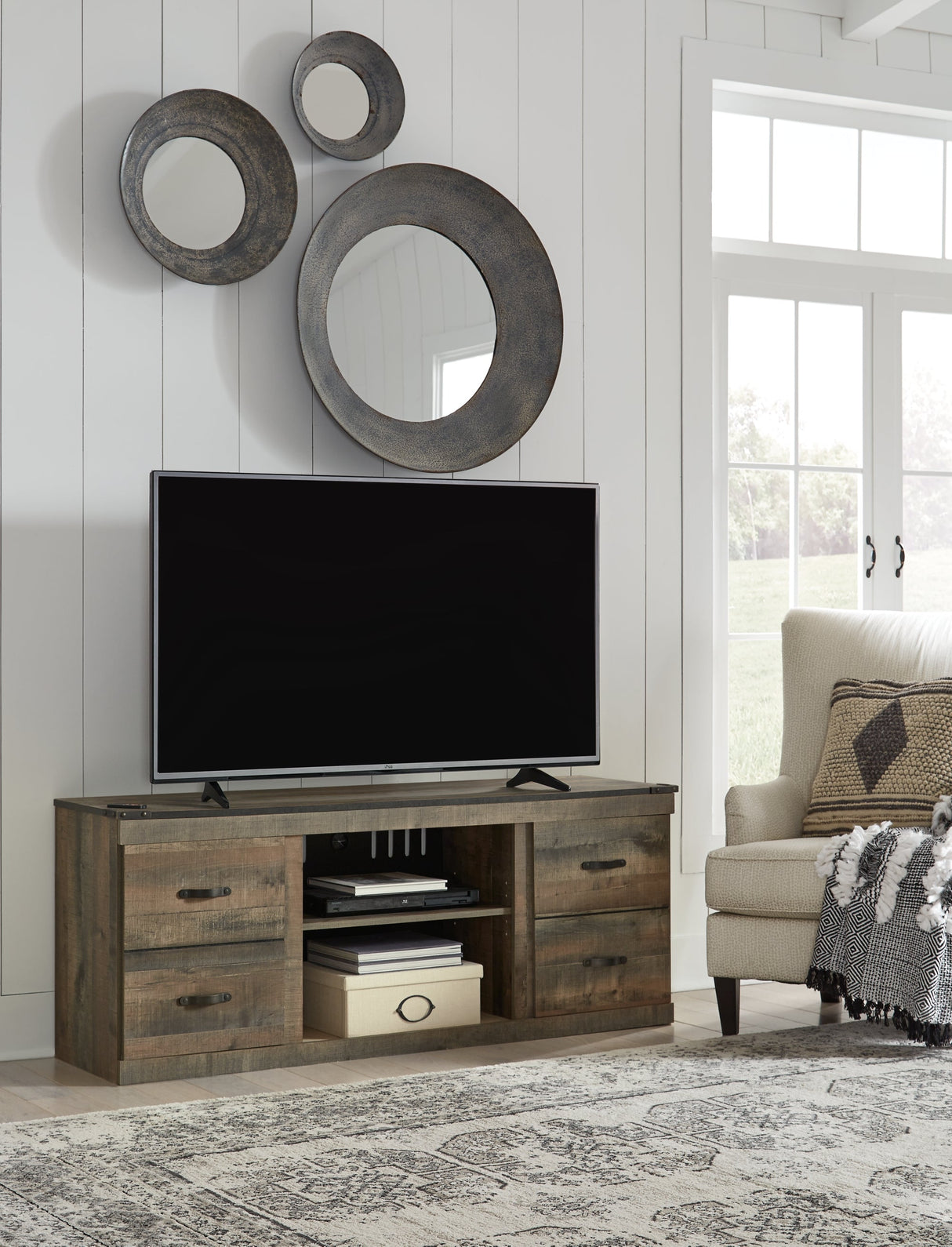 Trinell Brown 60" TV Stand by Ashley at Eve Furniture