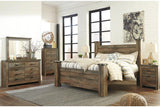 Trinell Brown King Poster Bed by Ashley at Eve Furniture