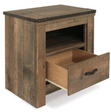 Trinell Brown Panel Bedroom Set by Ashley at Eve Furniture