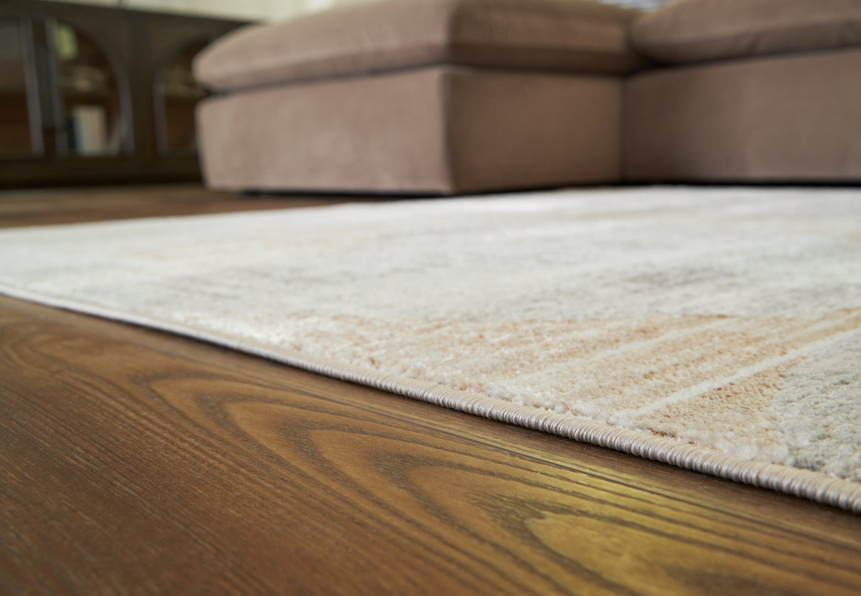 Truward Linen/Gray/Caramel Medium Rug by Ashley at Eve Furniture