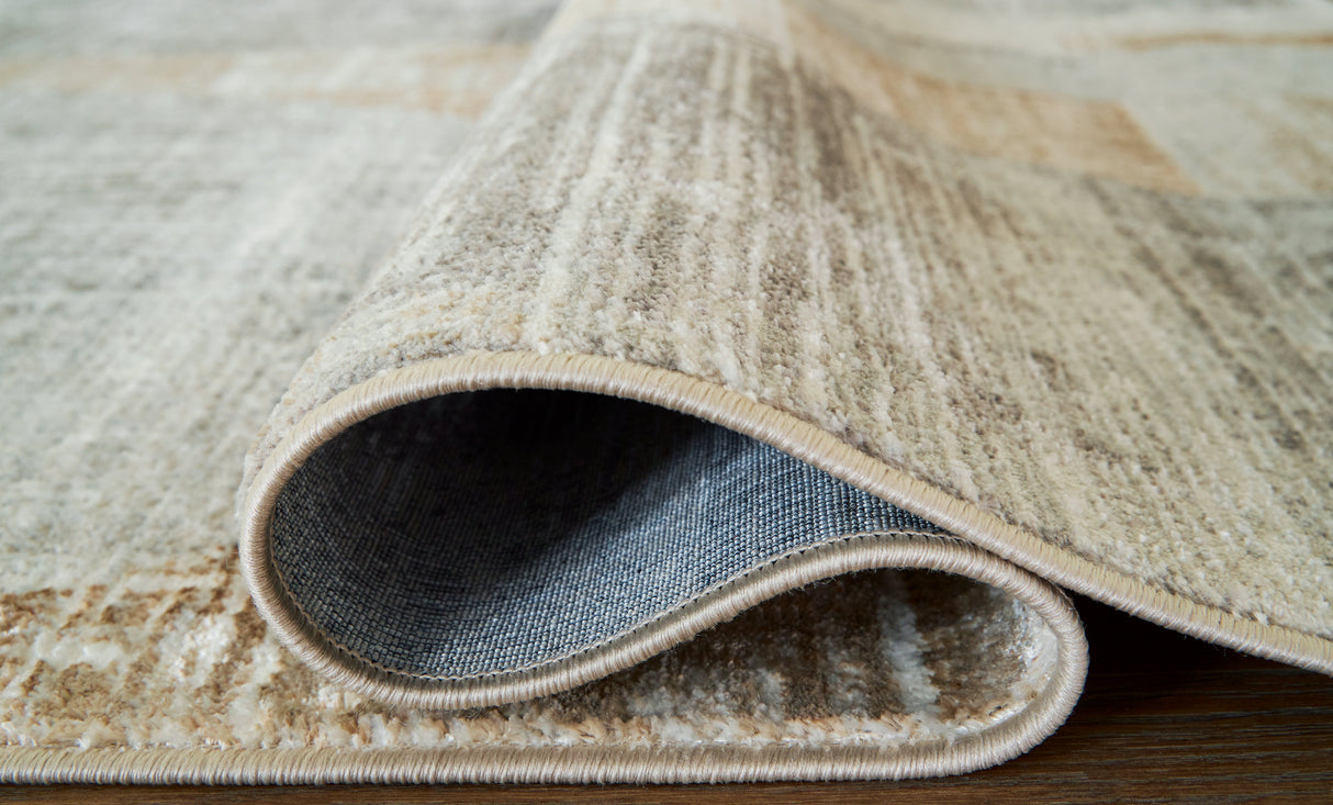 Truward Linen/Gray/Caramel Medium Rug by Ashley at Eve Furniture