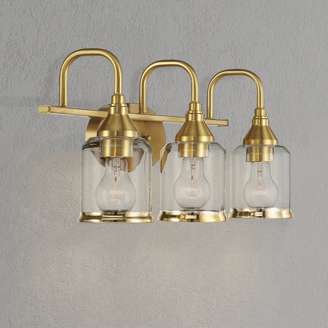 Twilight Three Lights Brushed Gold Contemporary Vanity Light 22"W × 10"H × 7.48"E with Clear Glass by Ashcroft Furniture at Eve Furniture