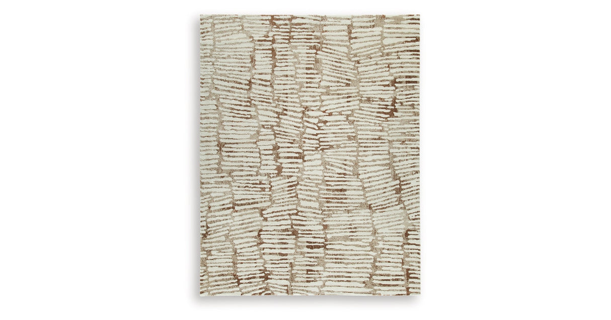 Uduak Cream/Tan/Rust Large Rug by Ashley at Eve Furniture
