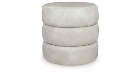 Ummi Bone Swivel Accent Ottoman by Ashley at Eve Furniture