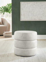 Ummi Bone Swivel Accent Ottoman by Ashley at Eve Furniture