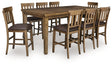Urbinforte Counter Height Dining Table and 8 Barstools by Ashley at Eve Furniture