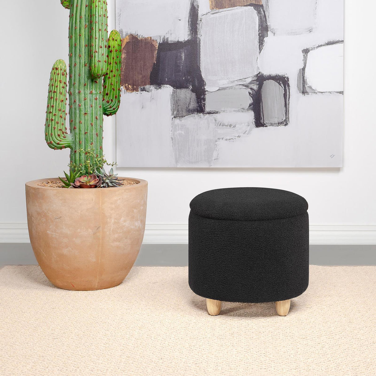 Valia Black Faux Sheepskin Upholstered Round Storage Ottoman by Coaster at Eve Furniture