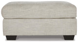Vayda Pebble Ottoman by Ashley at Eve Furniture