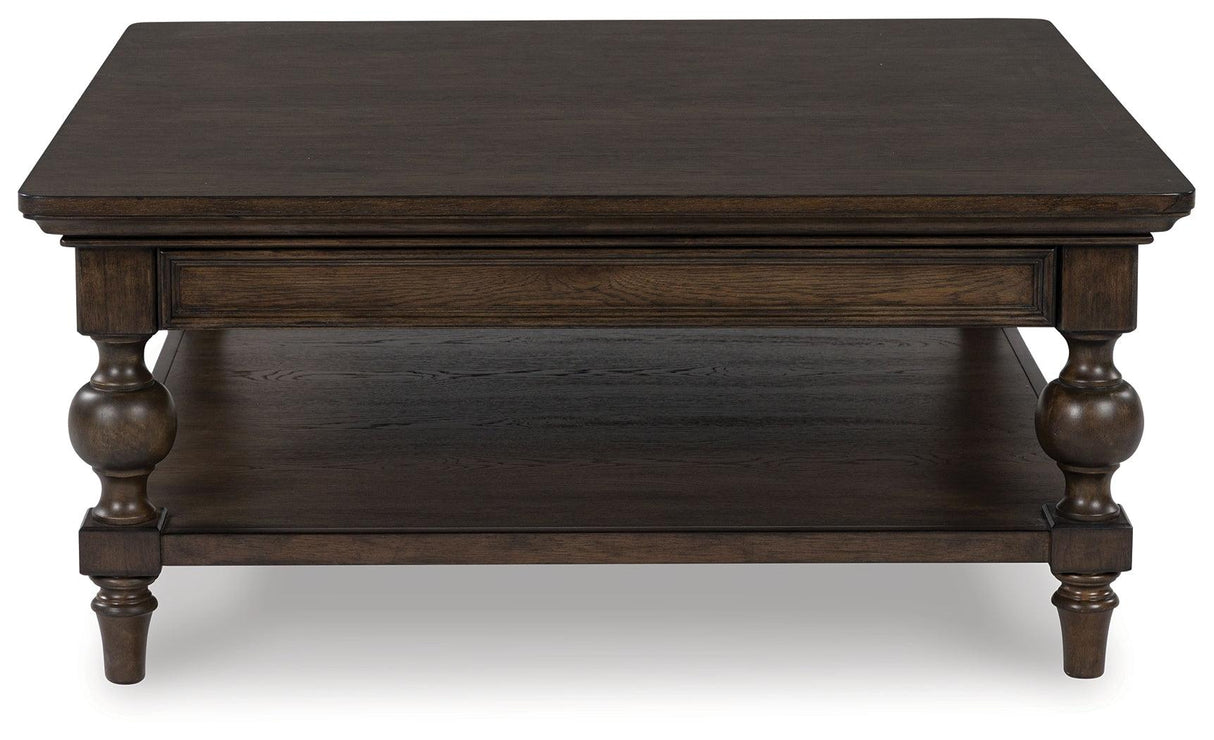 Veramond Dark Brown Coffee Table by Ashley at Eve Furniture