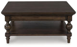 Veramond Dark Brown Coffee Table by Ashley at Eve Furniture