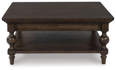 Veramond Dark Brown Coffee Table by Ashley at Eve Furniture