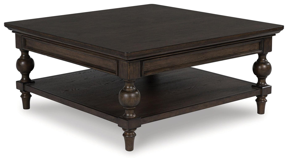 Veramond Dark Brown Coffee Table by Ashley at Eve Furniture