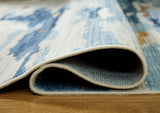 Vinlett Cream/Blue/Brown Washable Medium Rug by Ashley at Eve Furniture
