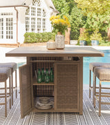 Walton Bridge Driftwood Outdoor Bar Table with Fire Pit by Ashley at Eve Furniture