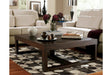 Watson Dark Brown Coffee Table by Ashley at Eve Furniture