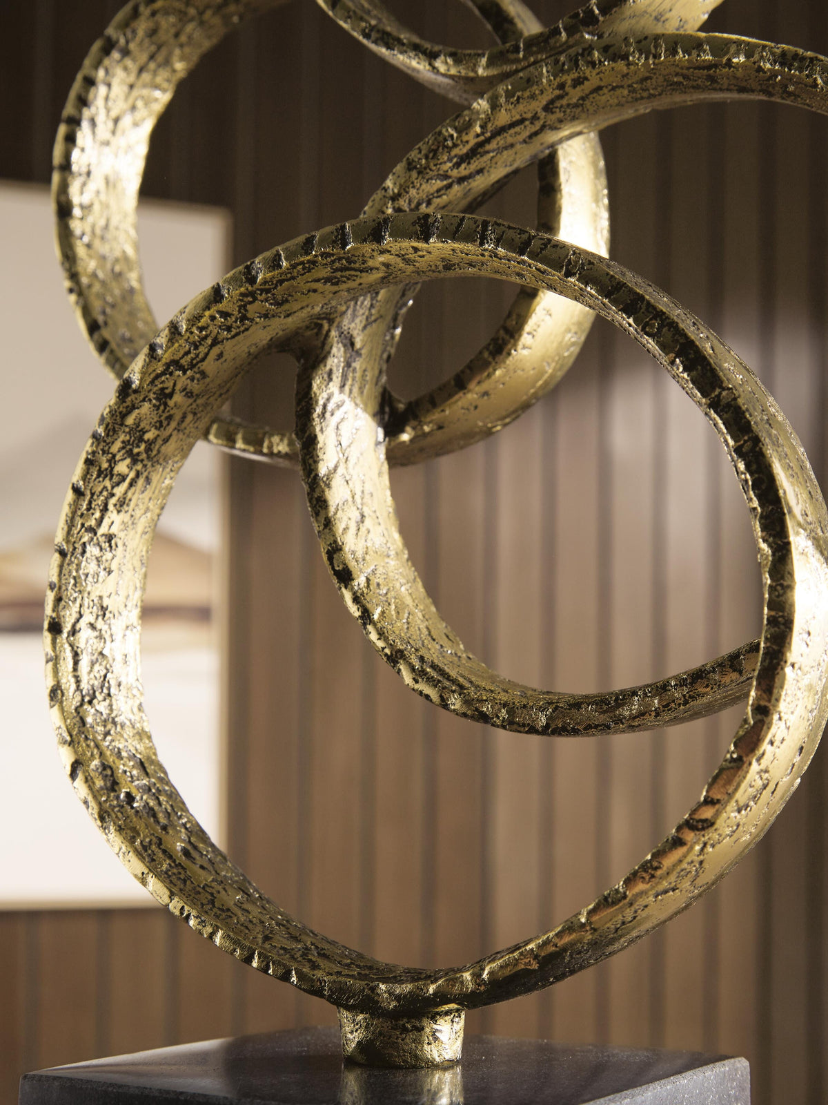 Wellcott Gold Finish/Black Sculpture by Ashley at Eve Furniture