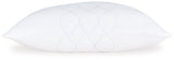 White Comfort Pillow by Ashley at Eve Furniture