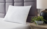 White Comfort Pillow by Ashley at Eve Furniture