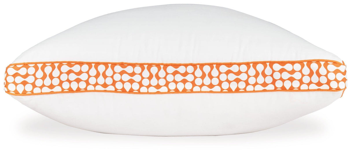 White/Orange 3-in-1 Pillow by Ashley at Eve Furniture