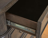 Wickenger Dark Brown Chest of Drawers by Ashley at Eve Furniture