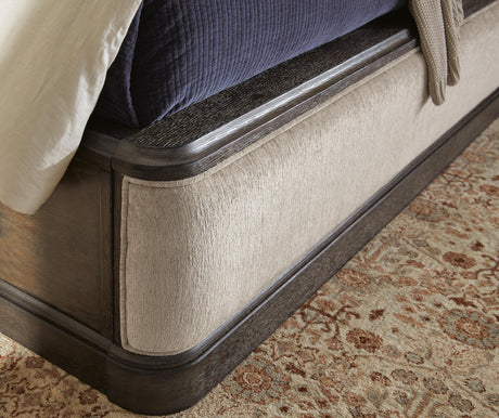 Wickenger Dark Brown Queen Upholstered Panel Bed by Ashley at Eve Furniture
