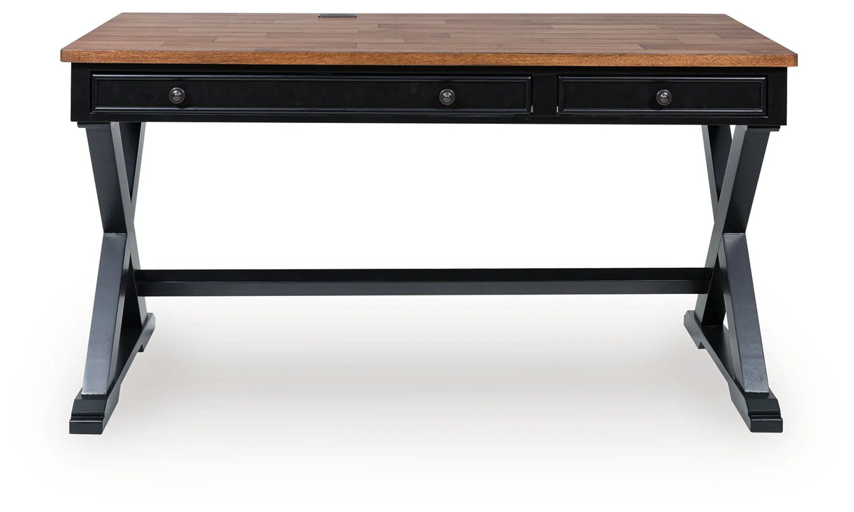Wildenauer Brown/Black 60" Home Office Desk by Ashley at Eve Furniture