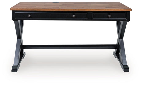 Wildenauer Brown/Black 60" Home Office Desk by Ashley at Eve Furniture