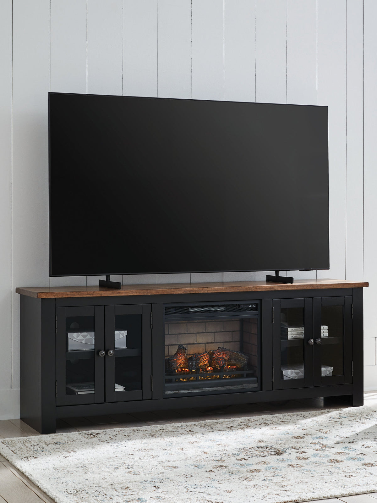 Wildenauer Brown/Black 76" TV Stand with Electric Fireplace by Ashley at Eve Furniture