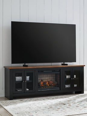 Wildenauer Brown/Black 76" TV Stand with Electric Fireplace by Ashley at Eve Furniture