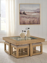 Wittenmyer Natural/Black Coffee Table with 4 Stools by Ashley at Eve Furniture