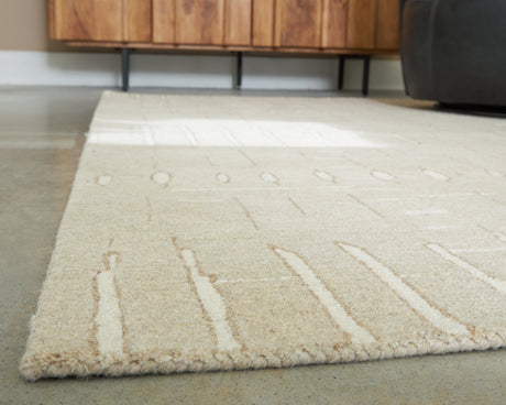 Wolbert Tan/Ivory Medium Rug by Ashley at Eve Furniture