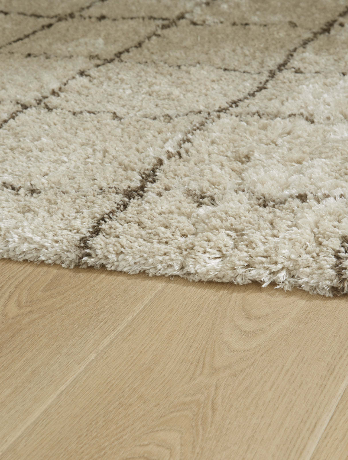 Wrenlow Cream/Brown Medium Rug by Ashley at Eve Furniture
