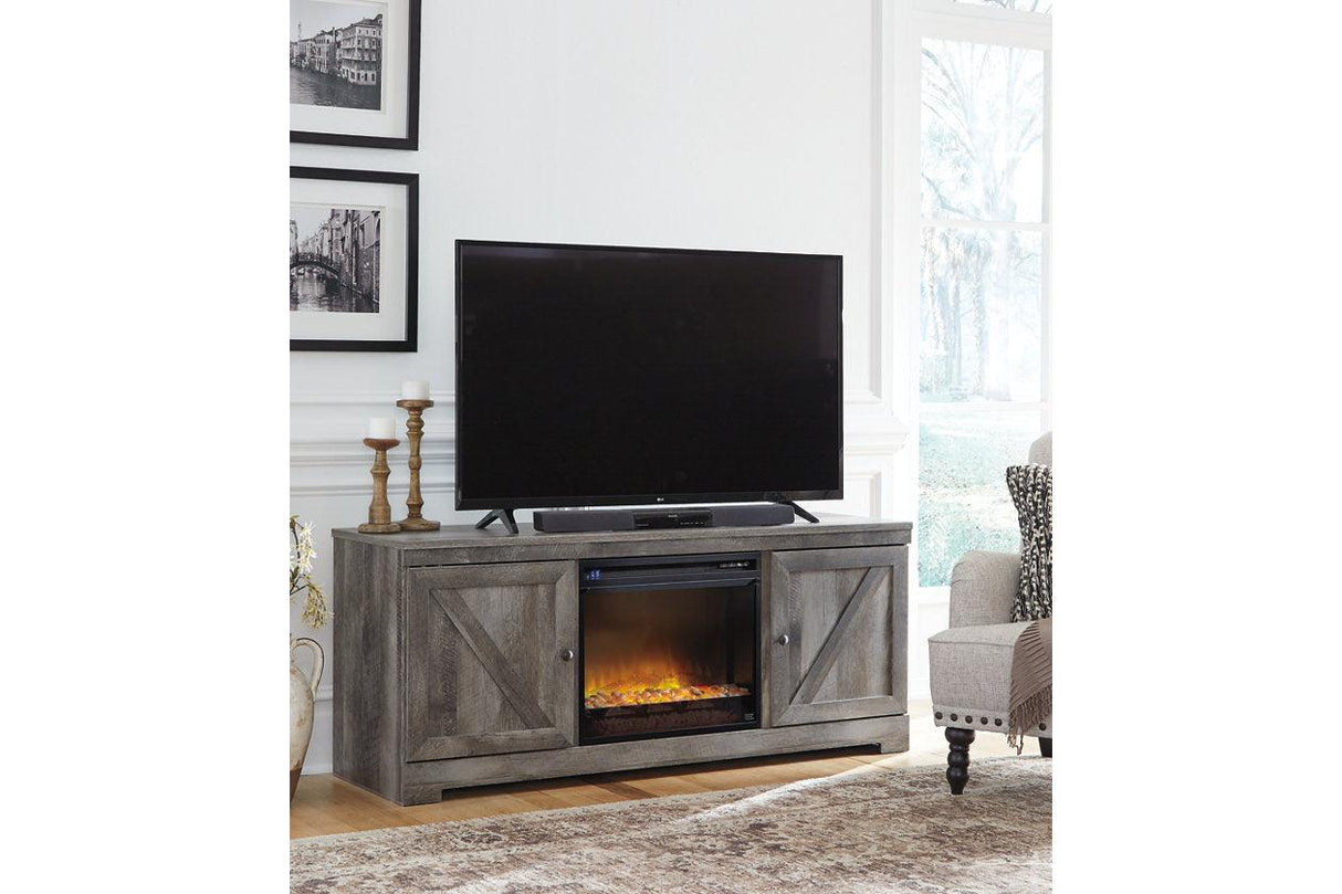 Wynnlow Gray 63" TV Stand with Electric Fireplace by Ashley at Eve Furniture