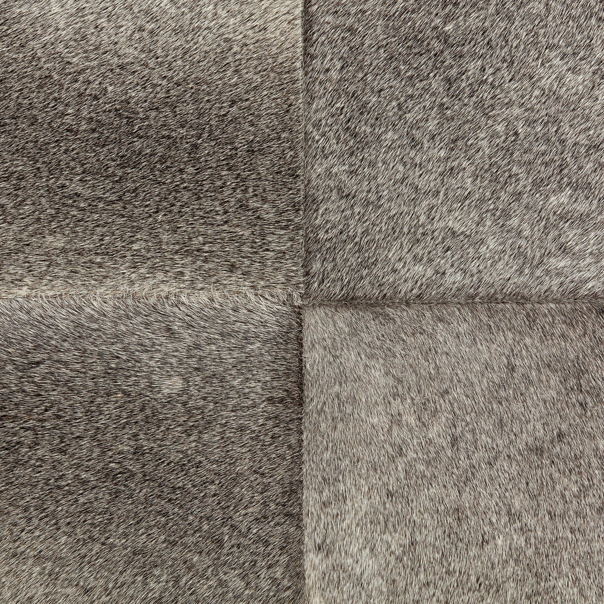 Zahavi I grey-toned hair-on-hide ottoman by Mercana at Eve Furniture