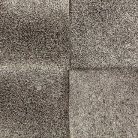 Zahavi I grey-toned hair-on-hide ottoman by Mercana at Eve Furniture