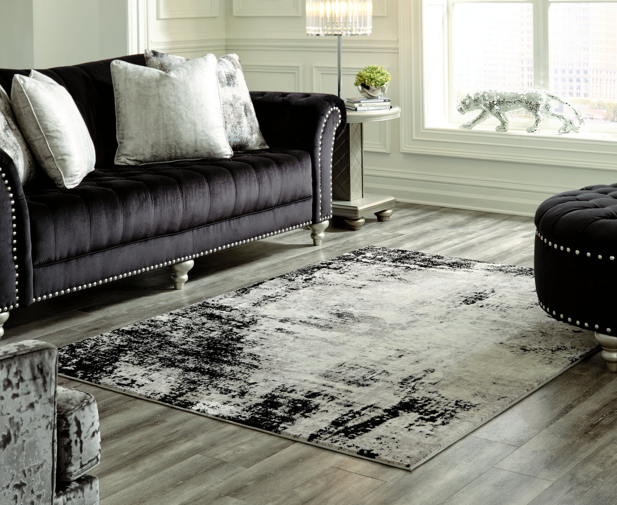Zekeman Black/Cream/Gray Large Rug by Ashley at Eve Furniture