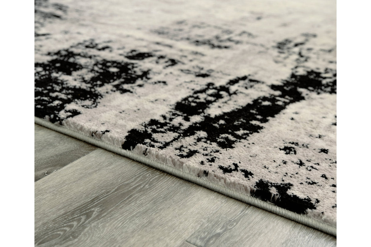 Zekeman Black/Cream/Gray Medium Rug by Ashley at Eve Furniture