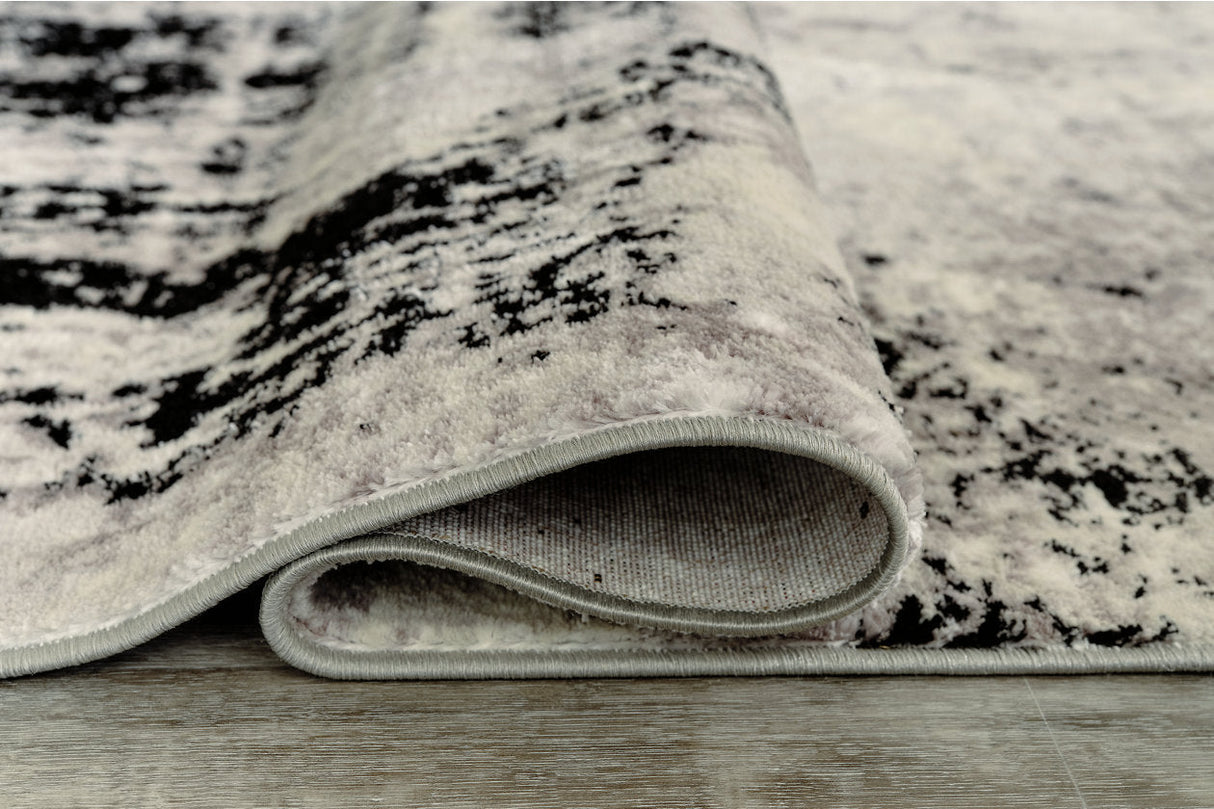 Zekeman Black/Cream/Gray Medium Rug by Ashley at Eve Furniture